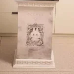 zimomo-angel-in-clouds-displaying-hanging-roman-column-base